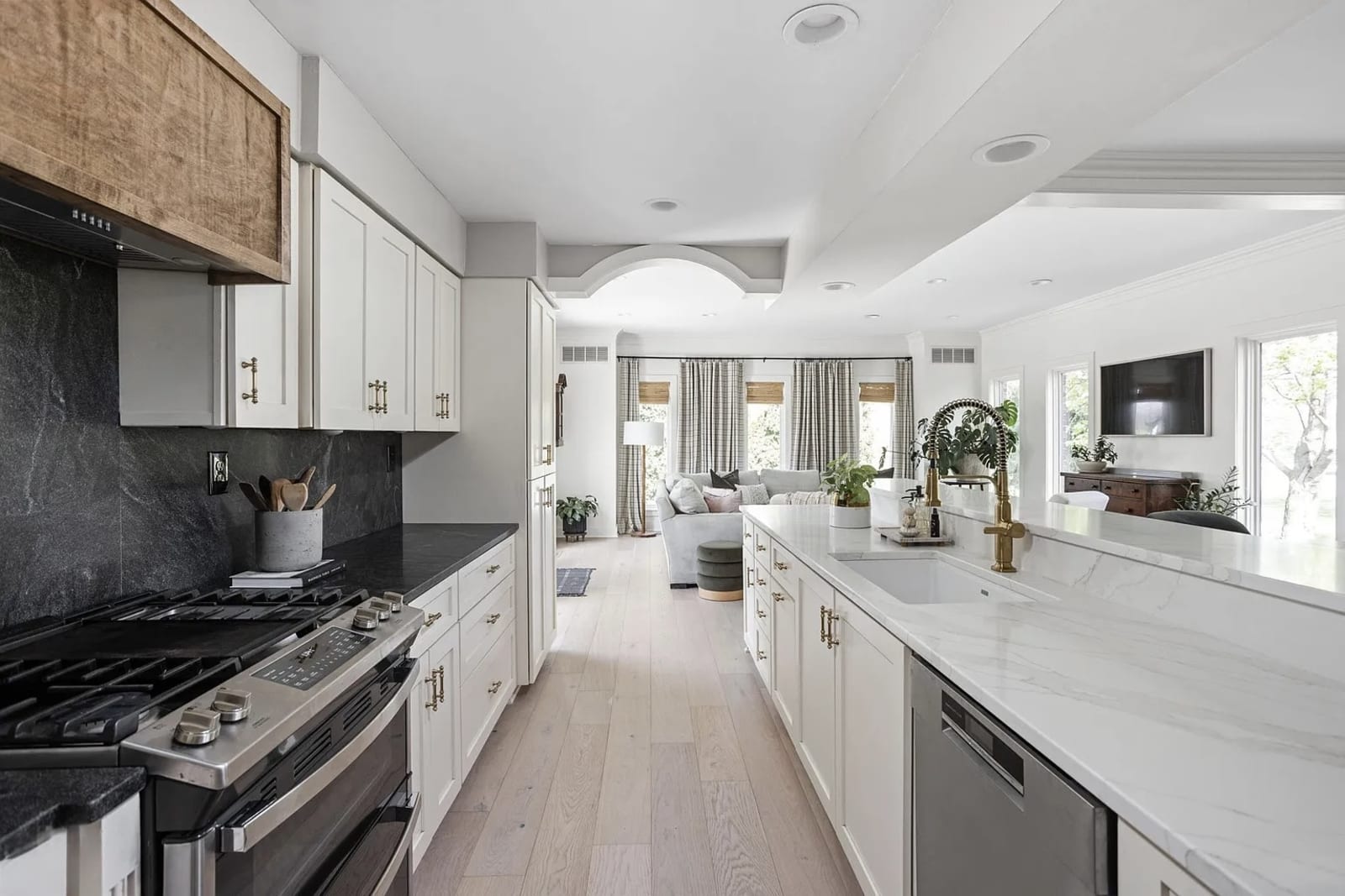 Wide-plank flooring running through an open-plan living space